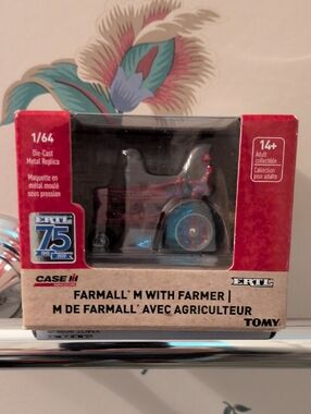 ertl 75th anniversary.  1/64th farmall M tractor and farmer.  2020.  unopened.